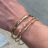 14kt Gold and Trio Diamond Five-Station Flex Bracelet