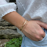 14kt GOLD AND TRIO DIAMOND FIVE STATION BRACELET