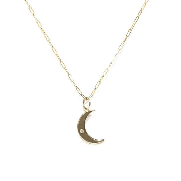 14kt Gold crescent moon necklace on a white background