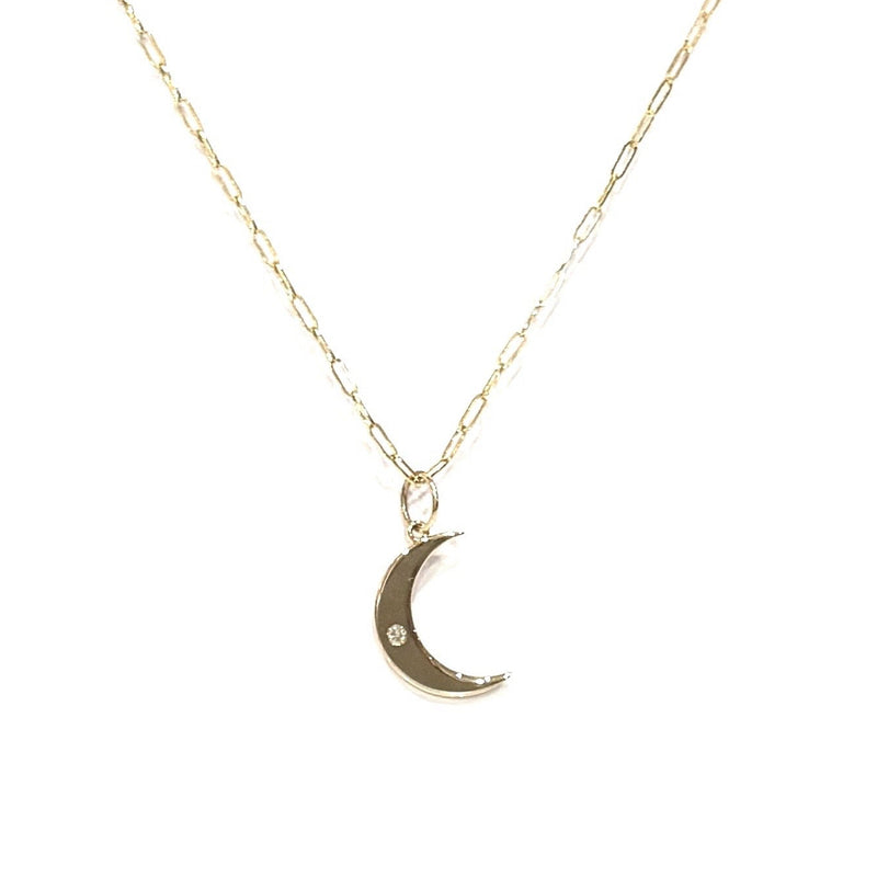 14kt Gold crescent moon necklace on a white background