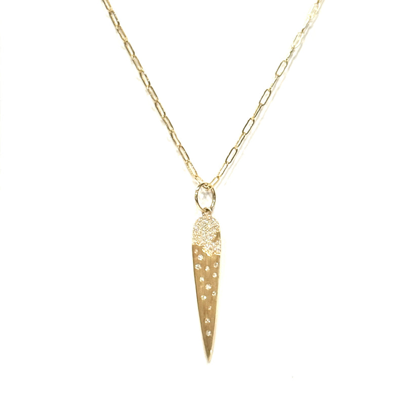 14kt Gold and diamond dagger/spike pendant on a white background