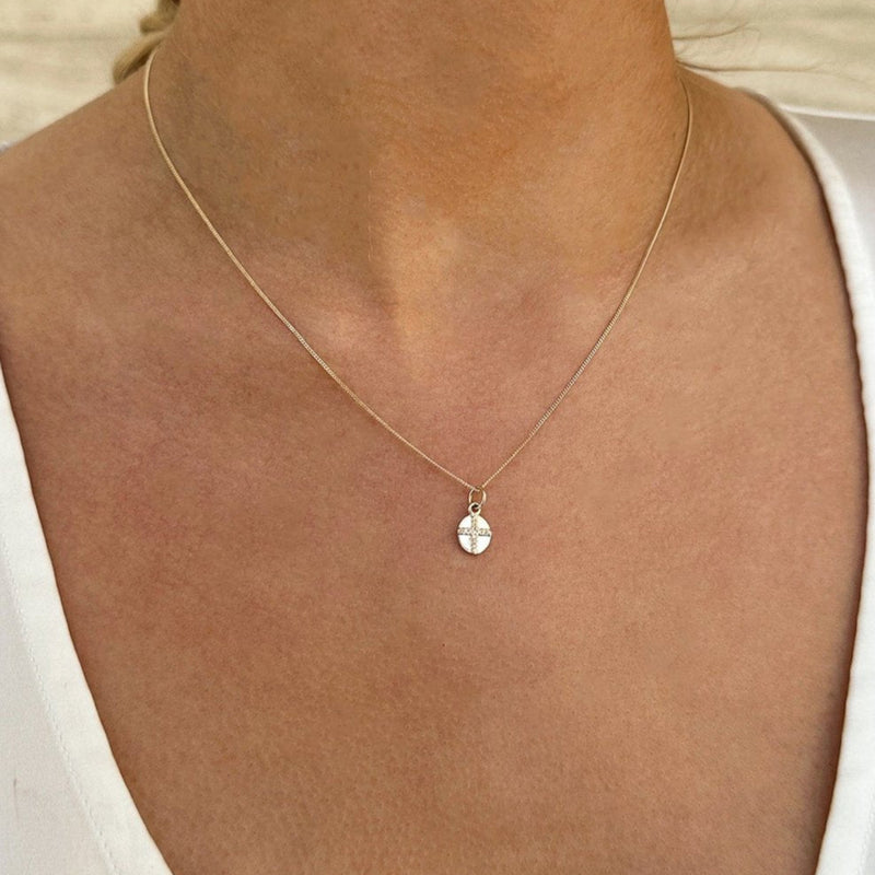 14kt Gold Oval Pendant and Diamond Cross necklace