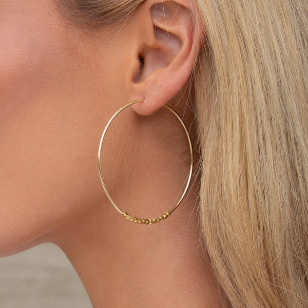 14kt gold-filled beaded large hoops. Water-resistant gold hoops.