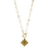 Be the object of every gaze. Our ARIANA, cross pendant necklace, will do just that. A large, matte, golden cross pendant is suspended from a 14kt gold-filled toggle on 14kt gold-filled chain. Go ahead and take the spotlight.   DETAILS & FIT Measures 18" 14kt gold-filled chain 14kt gold-filled toggle closure 18kt matte gold overlay pendant. Made to last and Made in the USA. A woman owned and operated business